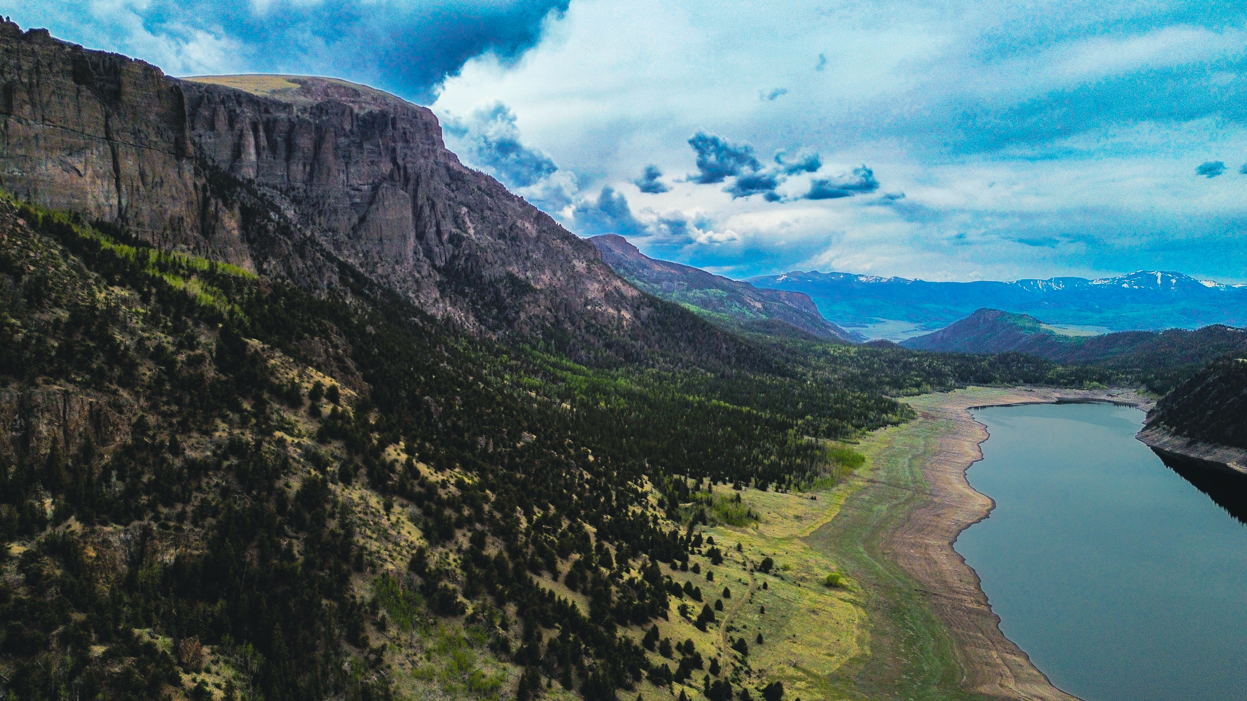 Aerial view of cliffs above a reservoir in Colorado's San Luis Valley